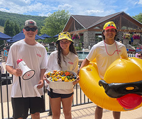 3 lifeguards at the Duck Derby.
