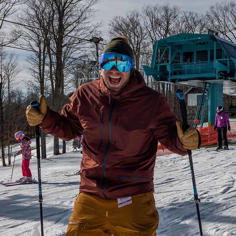 An excited skier on opening day!