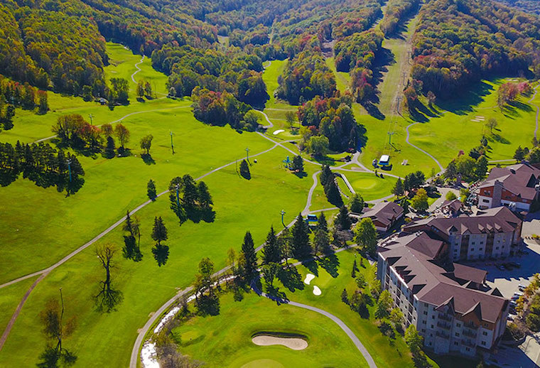 Aerial view of golf course and base lodge at Holiday Valley